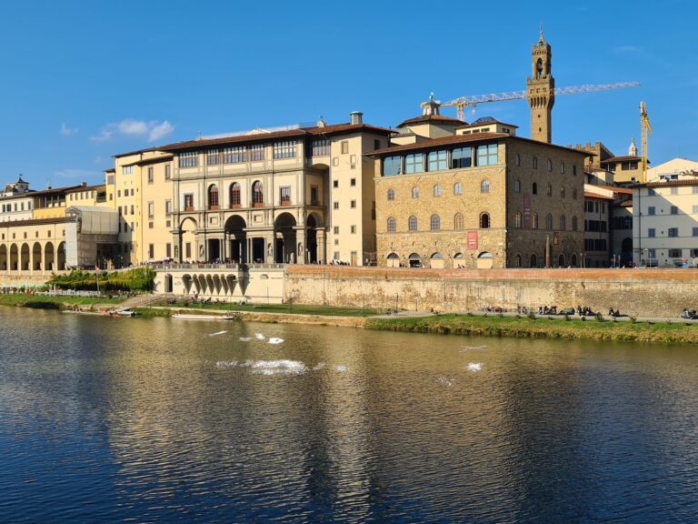 view of Uffizi and Arno Florence with Palazzo Vecchio in background