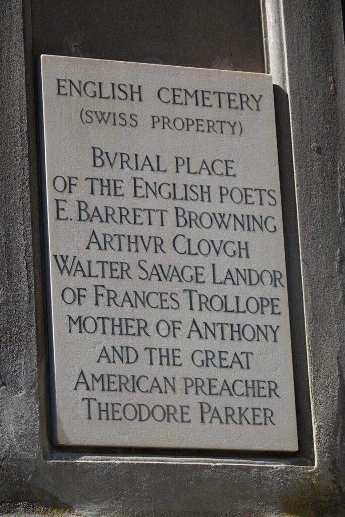 English Cemetery Florence entrance plaque noting Swiss ownership and burial place of Elizabeth Barrett Browning and other writers