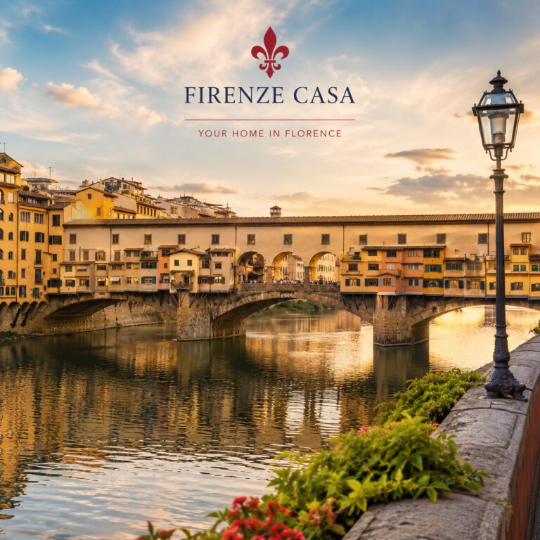 Golden sunset view of Ponte Vecchio in Florence, showing the historic bridge over the River Arno with its famous medieval shops and the Firenze Casa logo.