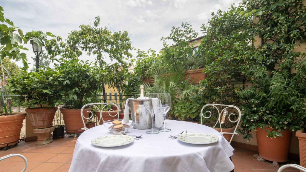 private terrace Florence apartment with set dining table